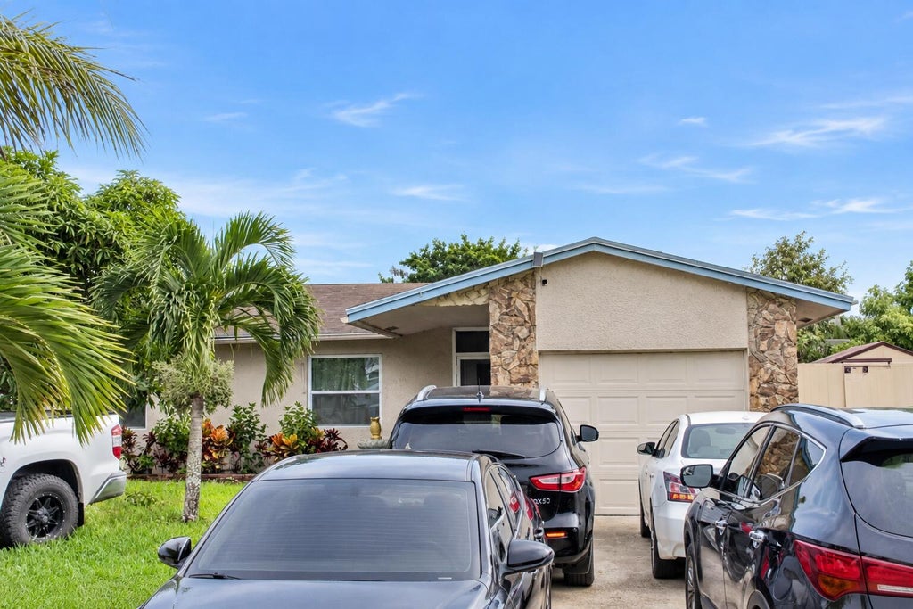 Photo of 7526 SW 8th Street, North Lauderdale, FL 33068 (MLS # B26075322)