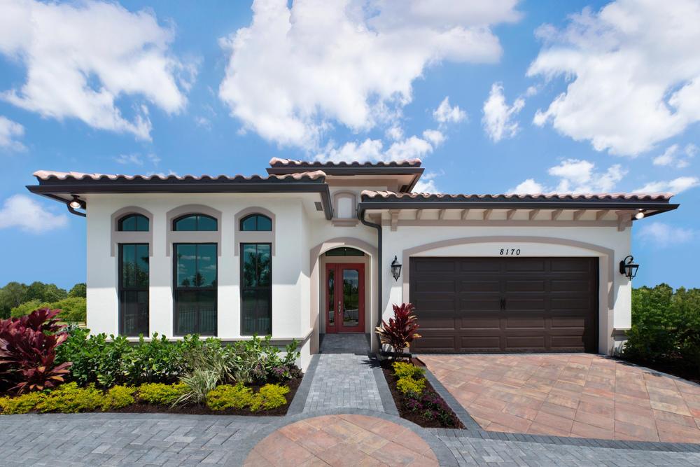 The Falls at Parkland is a new luxurious, highly-amenitized, Active Lifestyle (55+) community in prestigious East Parkland. Featuring a 24,000 sqft clubhouse w/ resort-style pool, state-of-the-art fitness center, yoga room, cafe, pickle & bocce ball courts, theatre, card/game rooms & more. The Saint Lucia Grande is a beautiful 2022 SqFt home w/ open floorplan featuring 2 bed (opt 3bed)/2 bath/2 car garage w/ dining. Show off the grand entrance w/ tall 11'4 ceilings filled w/ natural light from large impact glass windows. Design the gourmet kitchen included w/ luxury white soft-close cabinets, walk-in pantry, GE gas appliances open to big great room & large lanai. Grand owner suite w/ luxurious bath, his/her sinks, frameless glass shower & huge walk-in closet.