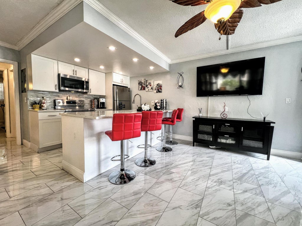 Photo of 625 ANTIOCH Avenue #101, Fort Lauderdale, FL 33304 (MLS # B26082049)