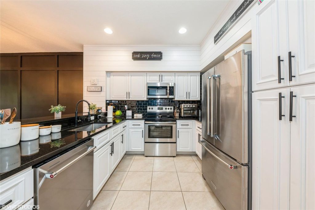 Photo of 4466 Leo Lane, Riviera Beach, FL 33410 (MLS # F10545348)