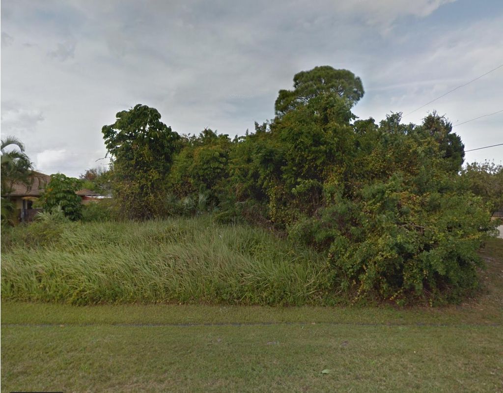 Photo of 2433 SE Renick Avenue, Port Saint Lucie, FL 34952 (MLS # R10859508)