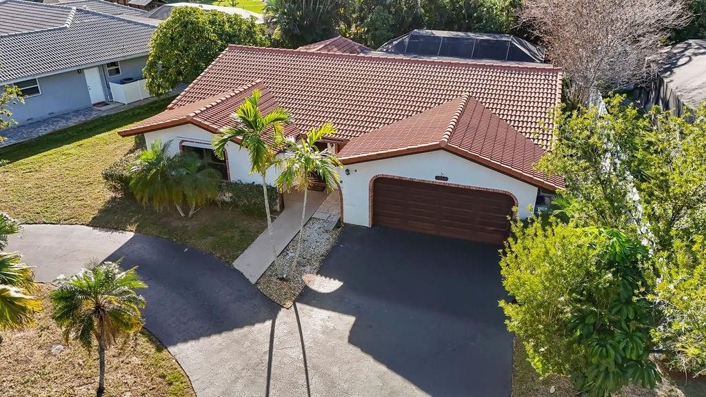 Photo of 1060 NW 82nd Avenue, Coral Springs, FL 33071 (MLS # F10553993)