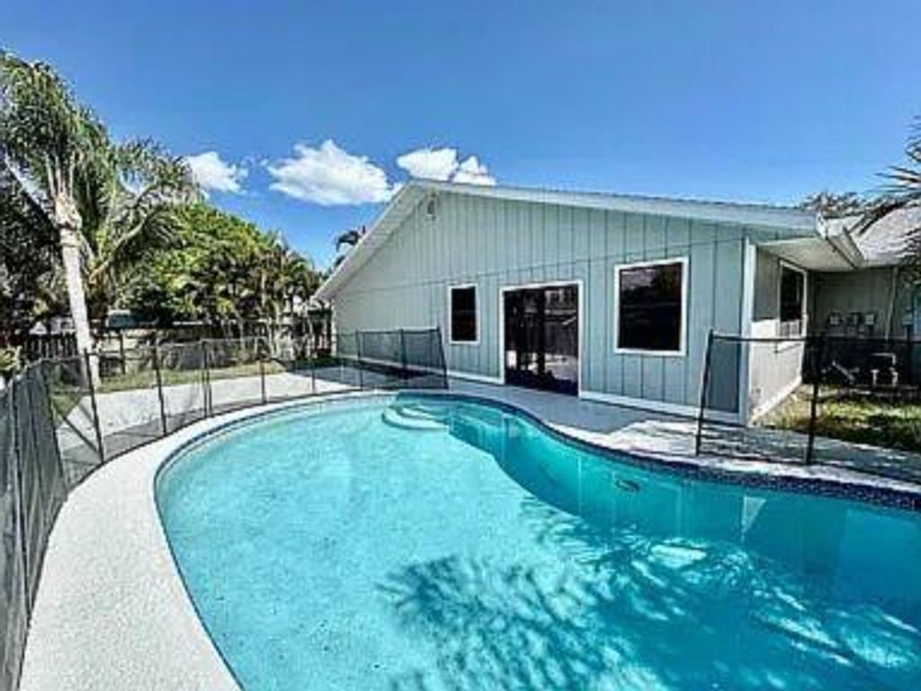 Photo of 6109 Tangelo Drive, Fort Pierce, FL 34982 (MLS # B26001445)