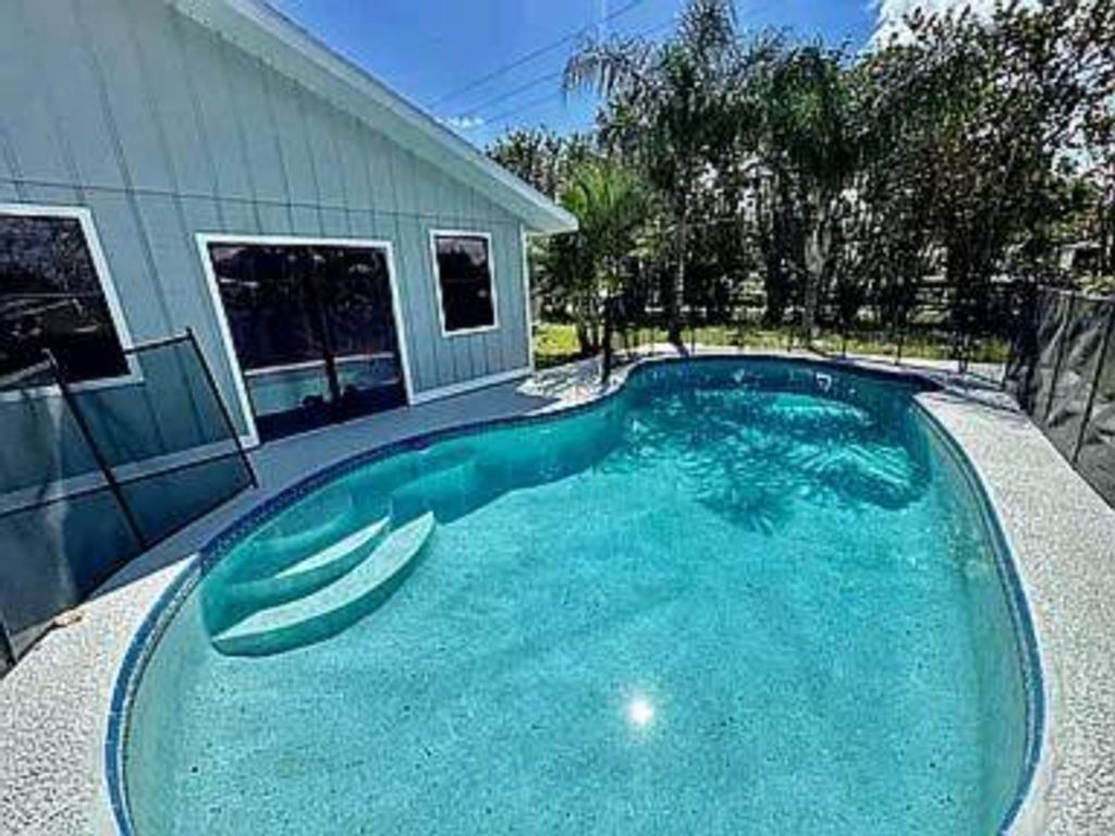 Photo of 6109 Tangelo Drive, Fort Pierce, FL 34982 (MLS # B26001445)