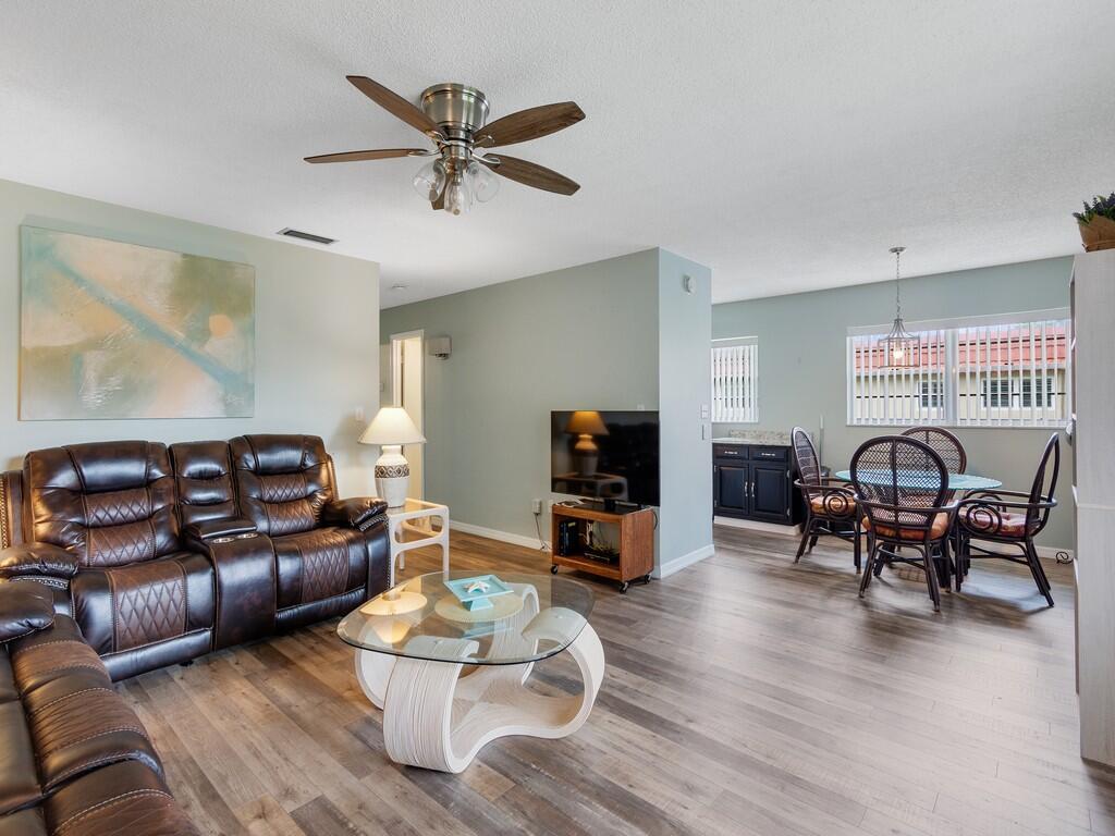 Beautifully maintained golf view property centrally located close to beaches, walking trails and lots of shopping stores in the area. This 2 bedroom 2 bath/ w patio. Partially furnished or can come unfurnished. A Must see! A well maintained unit with one owner. Stainless Steel appliances, Upgraded Vinyl Flooring. There is a new epoxy floor installed on the patio. It also has a ( 2025) New A/C unit and a new (2025) Hot water heater. Unit is located on the second floor and is move in ready. A 55+ community at Vista Royale. The community has 4 pools, a clubhouse, social clubs to meet new residents, a library, a sewing room, tennis courts, shuffleboard, picnic areas and workshops to create in. You will never be lonely again!