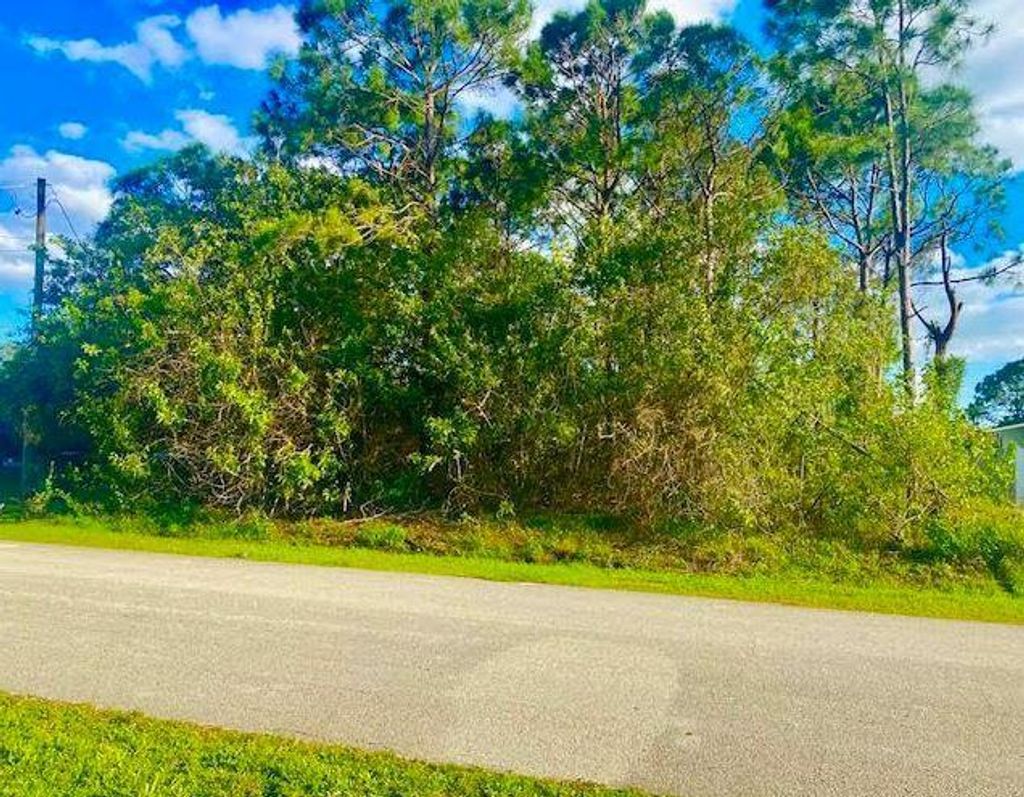 Photo of 5800 NW Wesley Road, Port St Lucie, FL 34986 (MLS # R10886991)