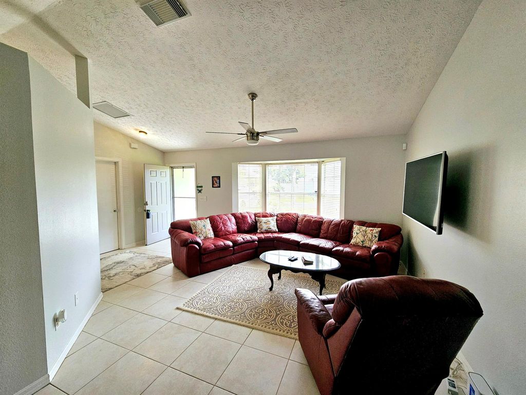 Photo of 4490 NW Albion Avenue, Port Saint Lucie, FL 34983 (MLS # R11083568)