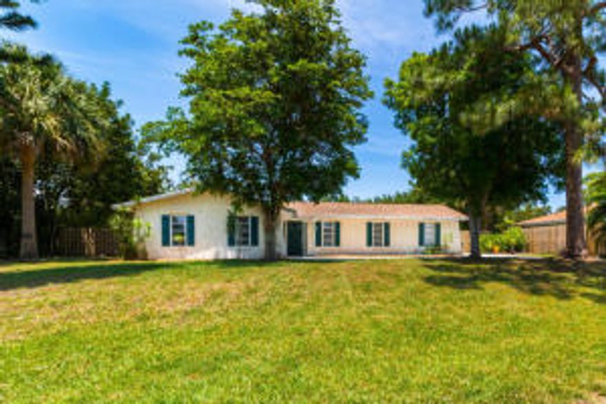 Exceptional community for this pool home located on a canal on a large homesite featuring Three Bedrooms and 2 full baths with a one car garage. Unique lot with ability to park a boat or RV. Spacious fenced backyard and oversize pool deck welcomes lots of options for outdoor enjoyment! Great room/family room overlooks the pool perhaps a great place for a pool table!!!