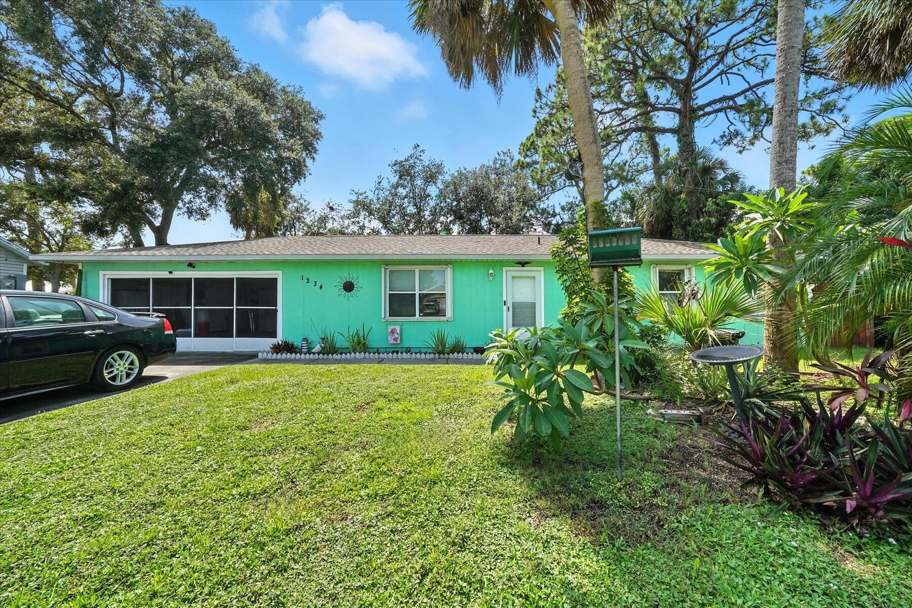 Cute partially updated 2 bed 2 bath with recent roof, HVAC on City water and sewer and a large screened lanai. Oversized driveway for the toys. Large yard in front and back, Tile floors throughout, newer stainless steel appliances and recent Hurricane shutters. Located in a fantastic area just minutes from some of Brevard's best companies, schools, shopping, restaurants, beaches, Medical facilities and Highway 95.