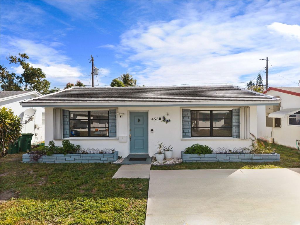 Photo of 4560 NW 17th Terrace, Tamarac, FL 33309 (MLS # F10553916)