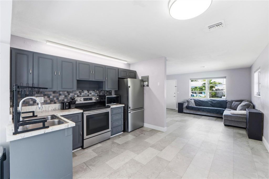 Photo of 4560 NW 17th Terrace, Tamarac, FL 33309 (MLS # F10553916)