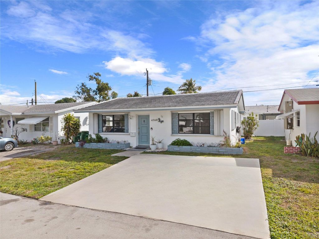 Photo of 4560 NW 17th Terrace, Tamarac, FL 33309 (MLS # F10553916)