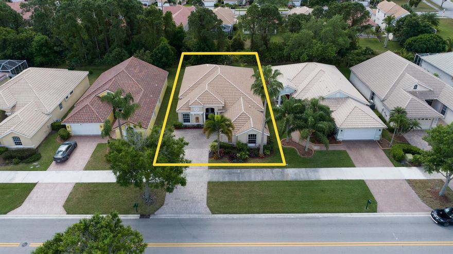 This gorgeous property is located in the desirable gated community of Lake Charles in Port St Lucie. It features vaulted ceilings, huge primary bedrooms, formal living areas with large windows throughout. Updated Kitchen appliances!! The house offers plenty of natural light from the large windows. The home is fully equipped with accordion shutters! The family room is oversized, breakfast area, island kitchen with plenty of cabinets space. Enjoy the convenience of being close to I-95 local shops and restaurants, schools and more! The master bedroom suite has a beautiful view of the garden. Property is freshly painted and new flooring. A recent addition to the screened in back deck with fresh new pavers has been made. This home is perfect for entertaining family and friends.