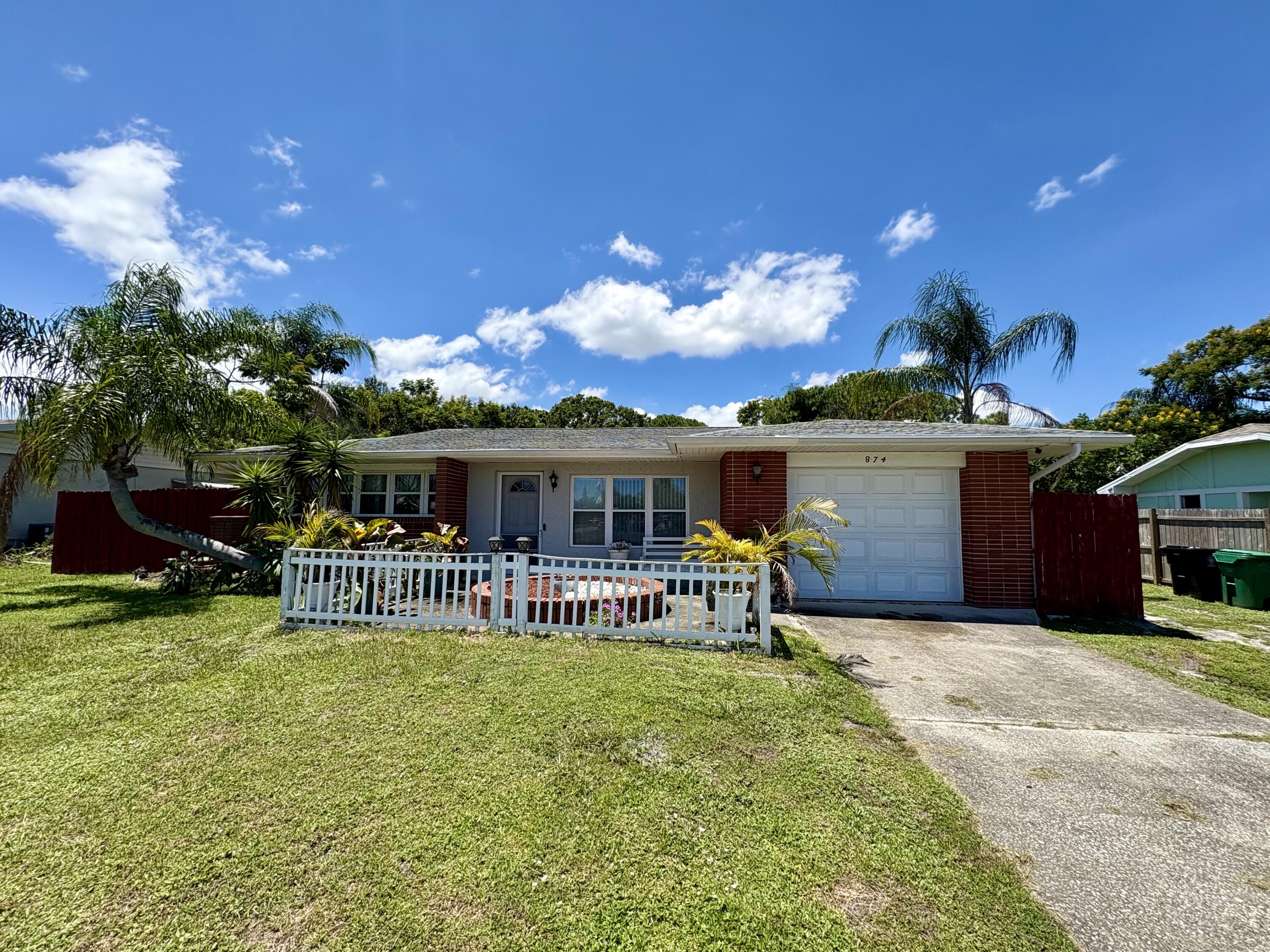 Cute CBS Home With Oversized Lot In The Heart of Port St Lucie. This 2bed 1.5 Bath Home Sits On A Large Oversized Fenced Lot And Is Close To St Lucie West, Turnpike, and I-95. This Gem Is Priced To Sell! Make it Your Dream Home With A Few Upgrades. Perfect For Anyone Looking To Downsize Or Your First Starter Home. Schedule Your Private Viewing Today!.