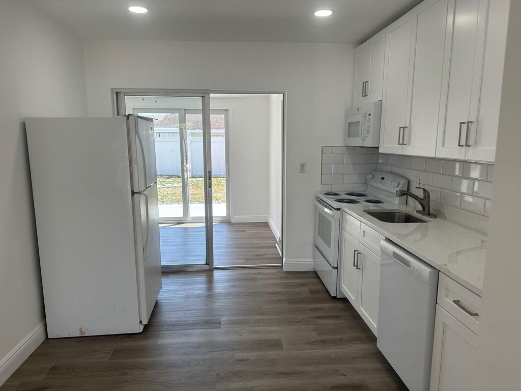 Photo of 1404 SE 3rd Terrace, Deerfield Beach, FL 33441 (MLS # F10494618)