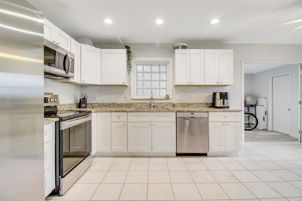 Photo of 9470 Birmingham Drive, Palm Beach Gardens, FL 33410 (MLS # R11017297)