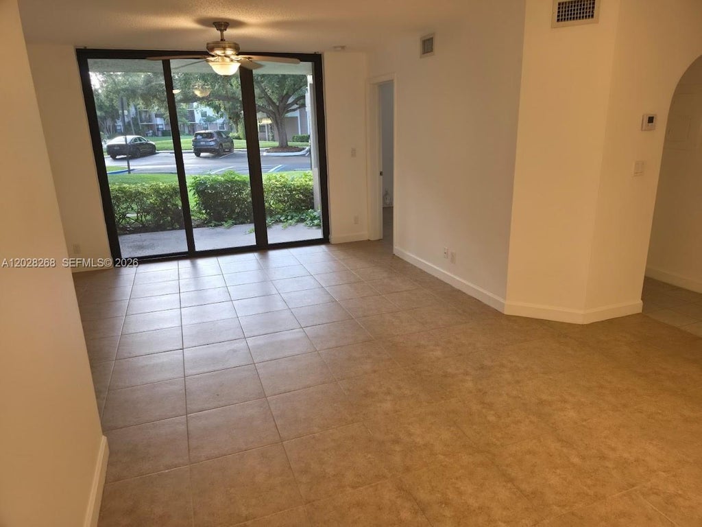 Photo of 10115 W Sunrise Boulevard #104, Plantation, FL 33322 (MLS # A12028268)