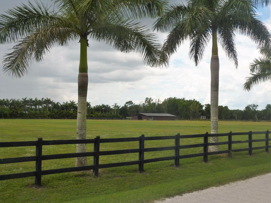 Beautiful, irrigated 5 acre parcel with a 12 stall center isle barn, tack/feed, 1/1 grooms apartment, washer, dryer. Stalls are matted 12 x 12. Fans and fly spray system in barn. 3 large paddocks and use of an additional 5 acres..., irrigated grass jump field (jumps included).  City water and septic.  Water/electric included in rent. Tenant responsible for wifi, fly spray and manure removal. 20 MINUTE HACK TO WEF, Price is per stall/per month for 4 mo season Entire 12 stalls for $40,000 for season....MINIMUM 6 STALLS. Grooms apartment to be negotiated depending on number of stalls/term