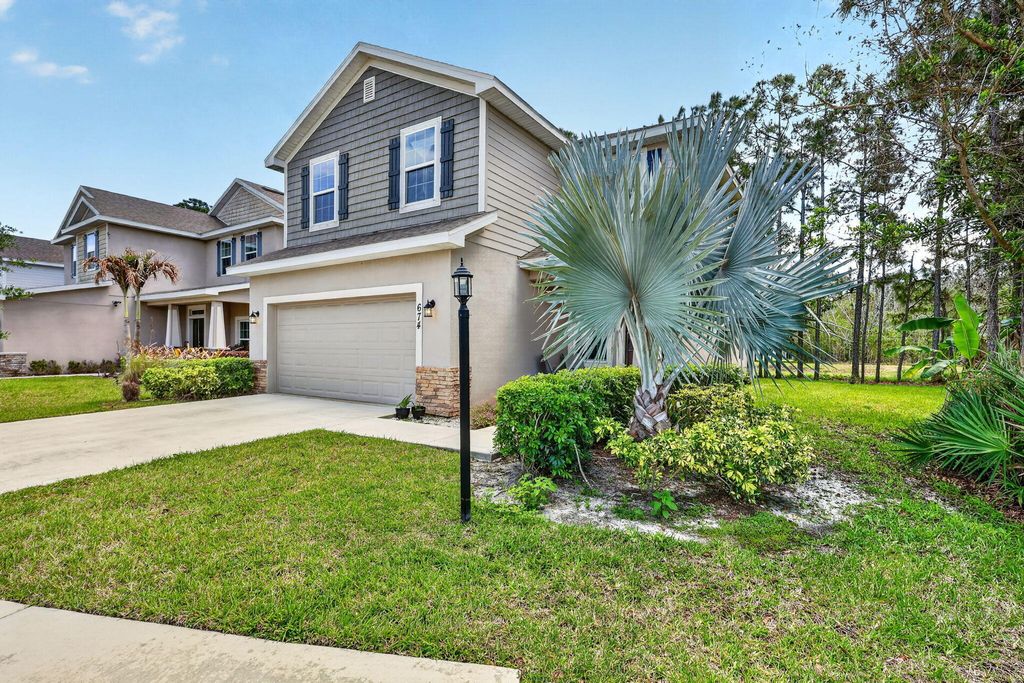 Photo of 674 NE Turtleback Trail, Port Saint Lucie, FL 34983 (MLS # B26017431)