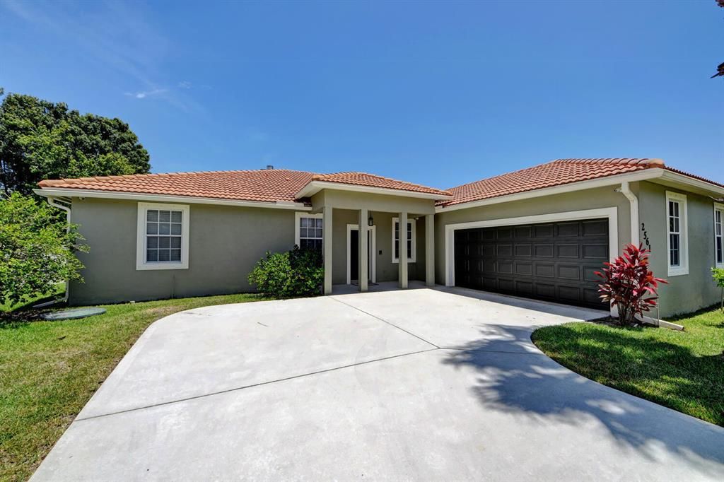Photo of 2561 SE Tiger Avenue Ave, Port St Lucie, FL 34952 (MLS # R10732384)