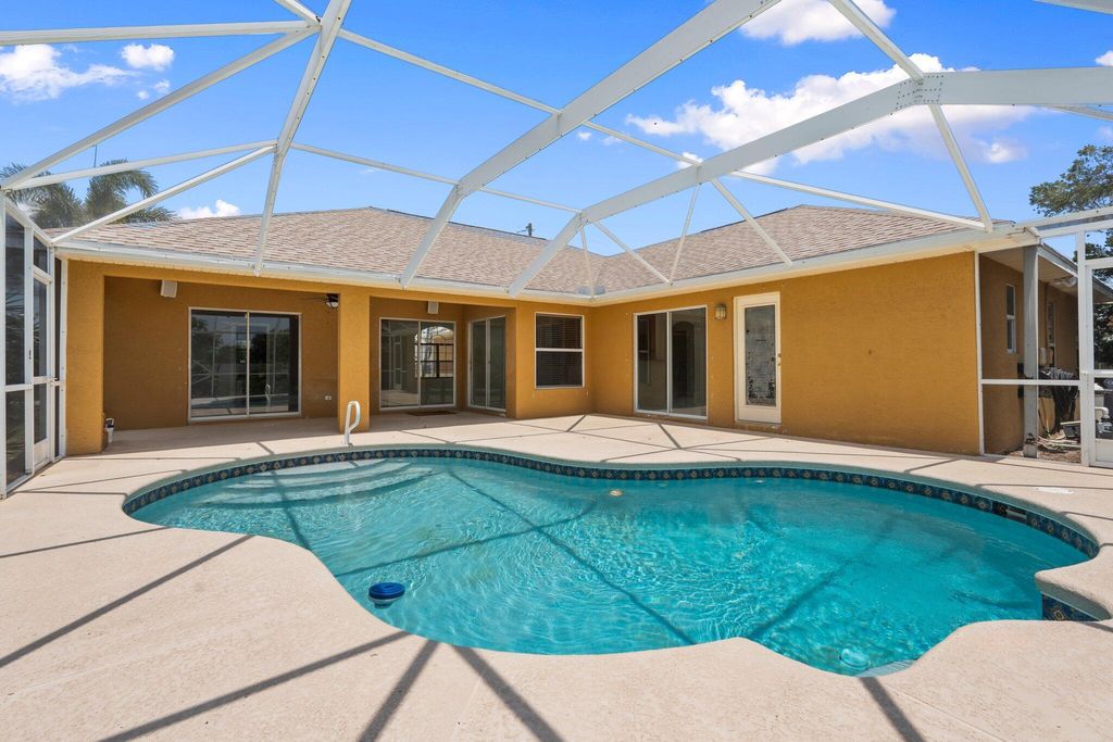 Photo of 632 SW Mccall Road, Port Saint Lucie, FL 34953 (MLS # R11092912)