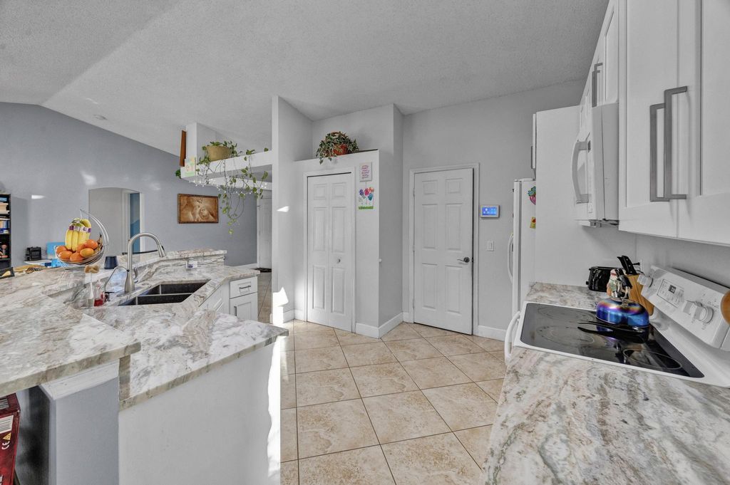 Photo of 201 NW Virgo Court, Port Saint Lucie, FL 34983 (MLS # R11090805)