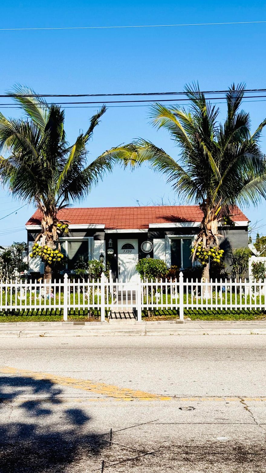 5320 Parker Ave is a charming corner bungalow offering 2 bedrooms, 1 bathroom, and a fully fenced yard with a paved patio - perfect for enjoying breezy coastal evenings.    Nestled in one of West Palm Beach's rapidly growing neighborhoods,  Located within biking and walking distance to the Intracoastal on Flagler Drive, and just minutes from Palm Beach International Airport, CityPlace, the Kravis Center, the Convention Center, and Palm Beach Island, this home delivers both lifestyle and convenience.  Concrete block construction, a recently paved backyard, a fully fenced lot, a 2021 HVAC system, and fresh professional paint are just a few of the upgrades that make this property a standout opportunity for first-time homebuyers, investors, or those looking to diversify their portfolio.  Short-term rentals are permitted, making it an ideal Airbnb-ready investment with strong income potential.  This is one you don't want to miss - schedule your private tour today.