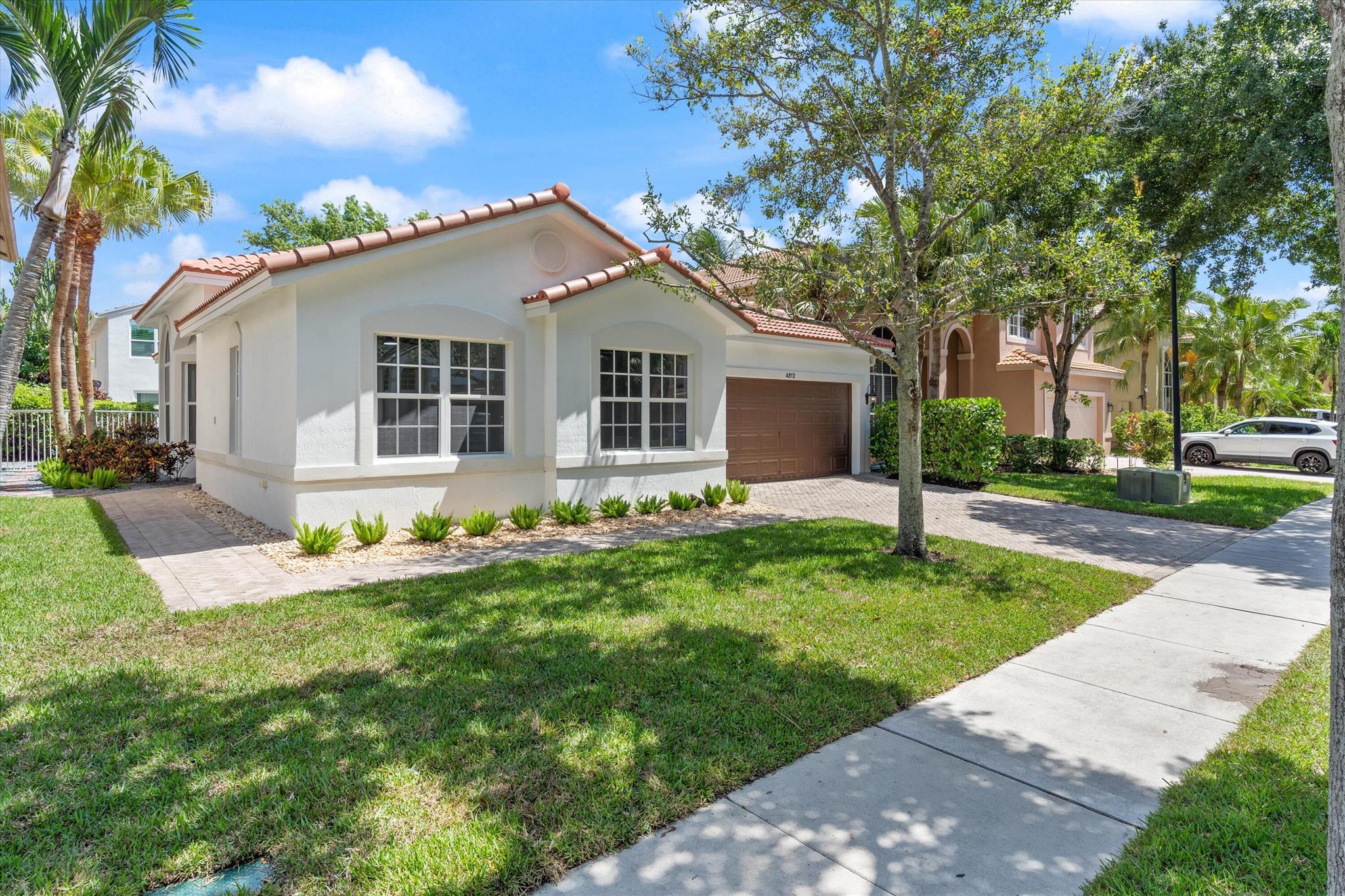 Must-see, completely renovated (2025) 4/2 pool home in the gated community of The Colony! Every inch of this property is NEW--fresh interior and exterior paint, brand-new roof, AC, water heater, COMPLETE IMPACT GLASS for max insurance credits, kitchen, and bathrooms, and even landscaping! Tastefully designed with high-end finishes and designer light fixtures, the bright, open floor plan offers seamless indoor-outdoor living. Enjoy a private, fenced backyard with a sparkling pool, perfect for relaxing or entertaining. Additional features include a 2-car garage and modern finishes throughout. Professionally staged furniture is available for purchase, making this home truly move-in ready. Community has a low HOA of only $315 per month and has a pool and hot tub, fitness center, and playground