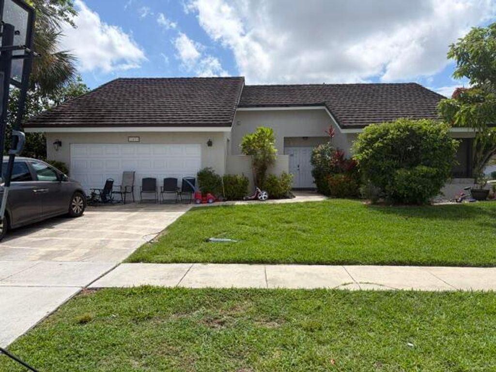 Photo of 22051 Montoya Drive, Boca Raton, FL 33433 (MLS # B26034983)
