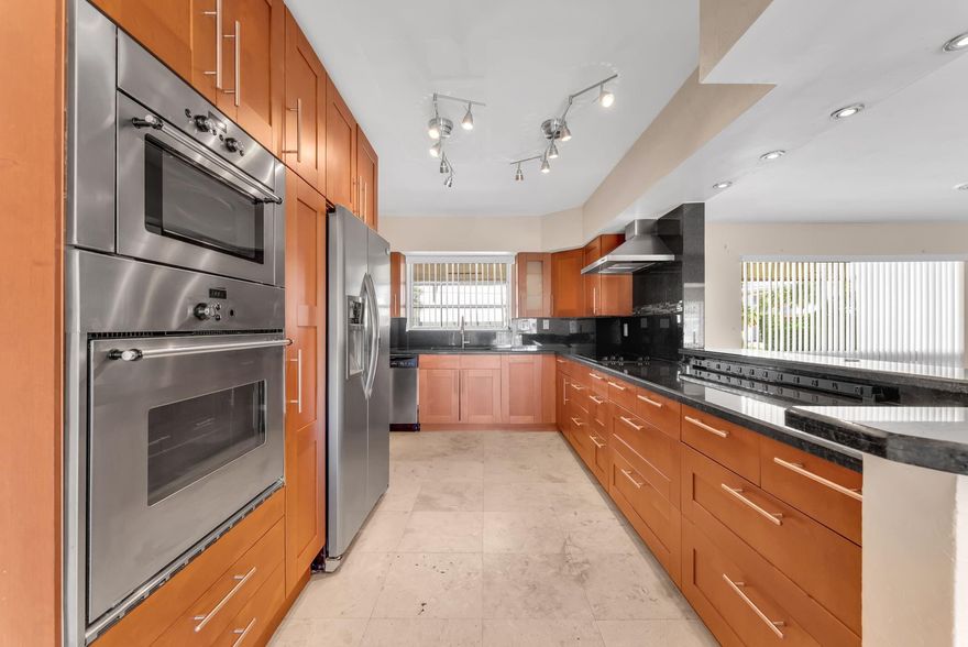 Where waterfront dreams begin: This residence offers 3 bedrooms, 3 bathrooms, and a 2-car garage, situated just four homes from the Intracoastal with direct ocean access and no fixed bridges. The home features a bright, open layout with laminate flooring, stainless steel appliances, and granite countertops. The primary suite includes two walk-in closets, while a 3rd bedroom with a private entrance and full bath provides excellent guest or in-law accommodations. With 70 feet of waterfront, this property offers endless potential to customize and make it your own in a highly desirable boating community, just minutes from the inlet and ocean. Tenant occupied until 10/29/26. All information deemed reliable but not guaranteed.