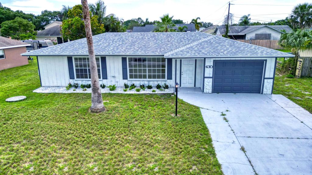 Photo of 430 SE Inwood Avenue, Port St Lucie, FL 34984 (MLS # R10901186)