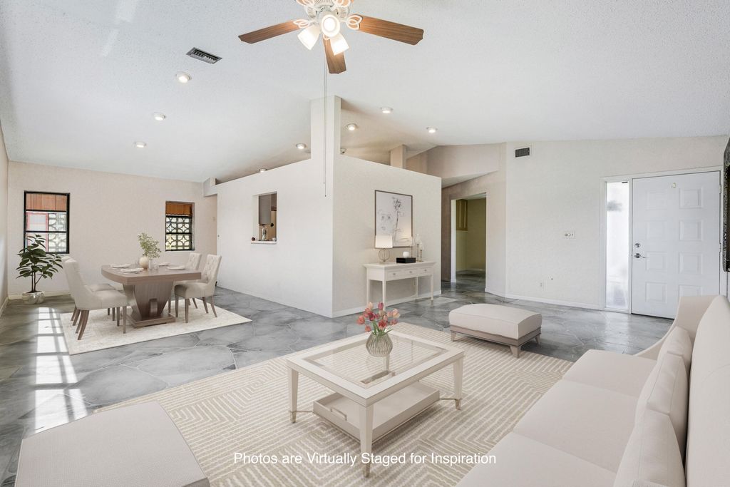 Photo of 8421 Bonita Isle Drive, Lake Worth, FL 33467 (MLS # R11128716)