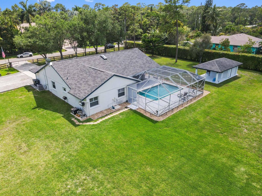 Photo of 14703 79th Court N, Loxahatchee, FL 33470 (MLS # R11082559)