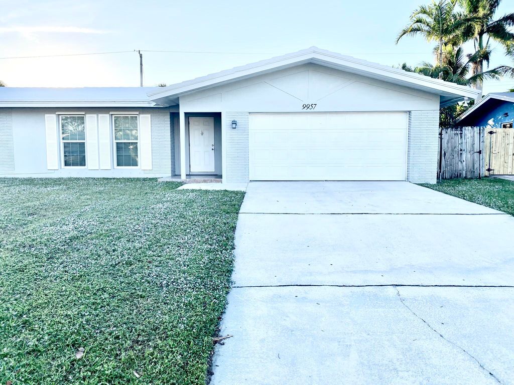 Photo of 9957 Dogwood Avenue, Palm Beach Gardens, FL 33410 (MLS # R10941473)
