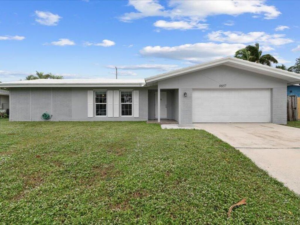Photo of 9957 Dogwood Avenue, Palm Beach Gardens, FL 33410 (MLS # R10941473)