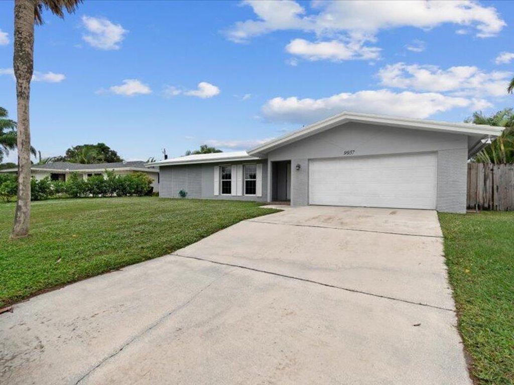 Photo of 9957 Dogwood Avenue, Palm Beach Gardens, FL 33410 (MLS # R10941473)