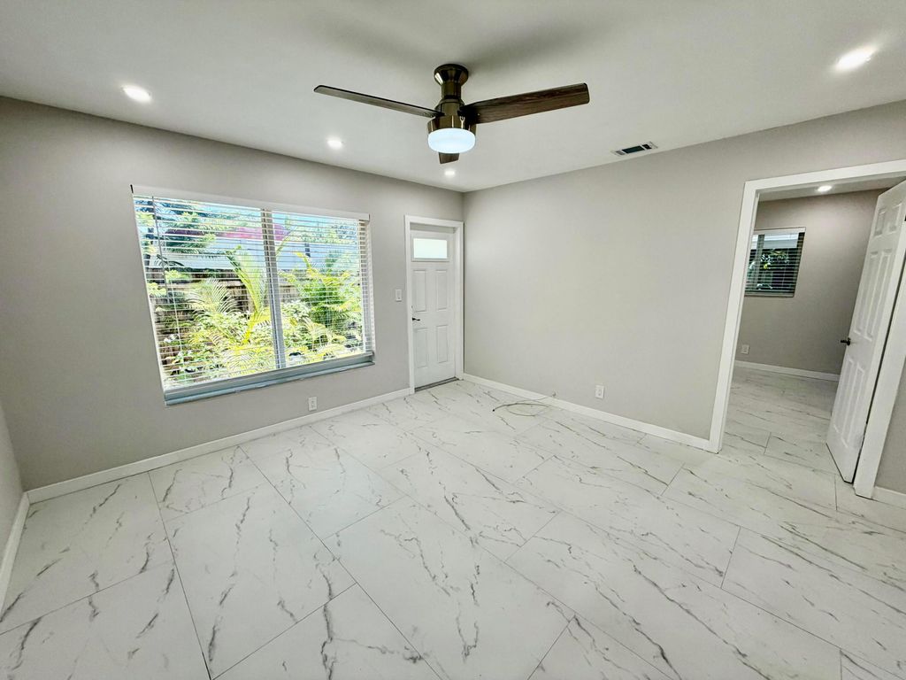 Photo of 1652 NE 33rd Street #B, Oakland Park, FL 33334 (MLS # B26026180)