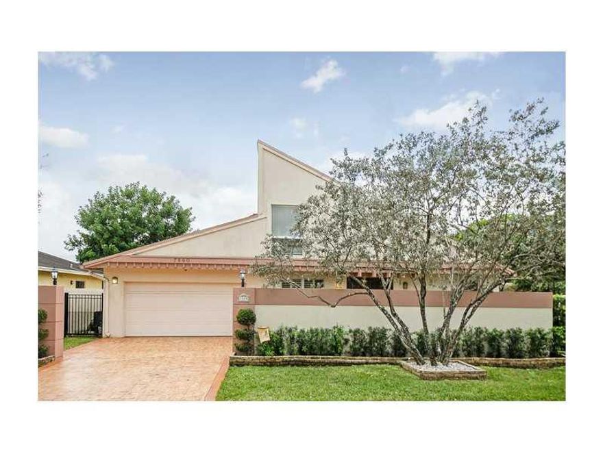 WONDERFUL HOME WITH LOTS OF UPGRADES, TILE FLOORS, IMPACT WINDOWS AND SLIDERS, LOTS OF LIGHT AND WINDOWS, THIS HOME IS SO WELL CARED FOR! MUST SEE!  CUSTOM BADU SWIM JET HEAT PUMP HEATED POOL WITH SOUND SYSTEM BUILT INTO POOL,  ELECTRIC SCREEN SEPARATE PA NELS REMOTE CONTROLED IN PORCH, WONDERFUL PATIO WITH  TRAVERTINE TILES, HOT WATER WET BAR, BUILT IN SLIDING CUSTOM STAINLESS STEEL CABINETS, REFRIDGERATOR, BEDROOM HAS BUILT IN BOOKCASE AND MURPHY BED, PLANTATION SHUTTERS, PVC GATE, SEE VIRTUAL TOUR