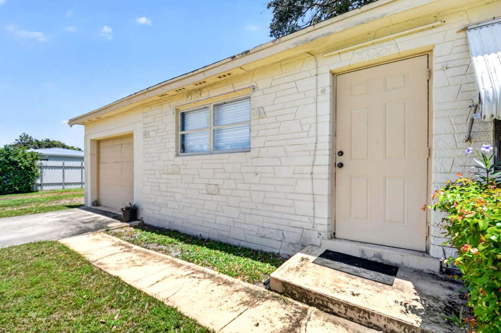 Photo of 1572 Woodland Avenue, West Palm Beach, FL 33415 (MLS # B26063363)