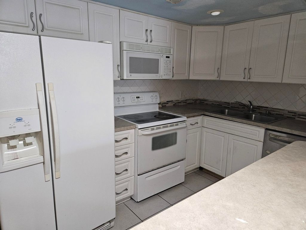 Photo of 5570 NW 44th Street NW #107a, Lauderhill, FL 33319 (MLS # B26007275)