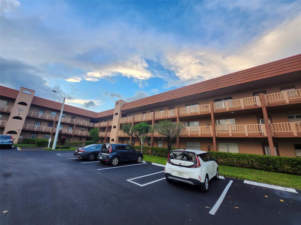 Photo of 9661 Sunrise Lakes Blvd #302, Sunrise, FL 33322 (MLS # F10532519)