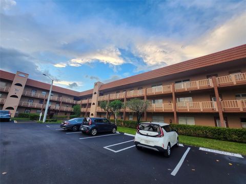 Photo of 9661 Sunrise Lakes Blvd #302, Sunrise, FL 33322 (MLS # F10532519)
