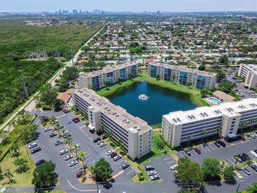 SPACIOUS TWO BEDROOM, TWO BATH CONDO IN EXCELLENT LOCATION EAST OF US1 IN DANIA BEACH, WALKING DISTANCE TO SHOPPING, RESTAURANTS, CASINO AND A SHORT BIKE RIDE TO THE BEACH. SCREENED BALCONY OFFERING SPARKLING, DIRECT VIEWS OF THE LAKE AND FOUNTAIN. UNIT HAS A LOT OF CLOSET SPACE. WONDERFUL FRIENDLY COMPLKEX THAT ALLOWS ALL AGES, FEATURES A POOL, CLUBHOUSE AND RELAXING SAUNA. THIS UNIT NEEDS UPDATING AND IS PRICED ACCORDINGLY. GREAT OPPRTUNITY TO UPDATE TO YOUR PREFERENCES AND PUT YOUR PERSONAL TOUCH ON IT.