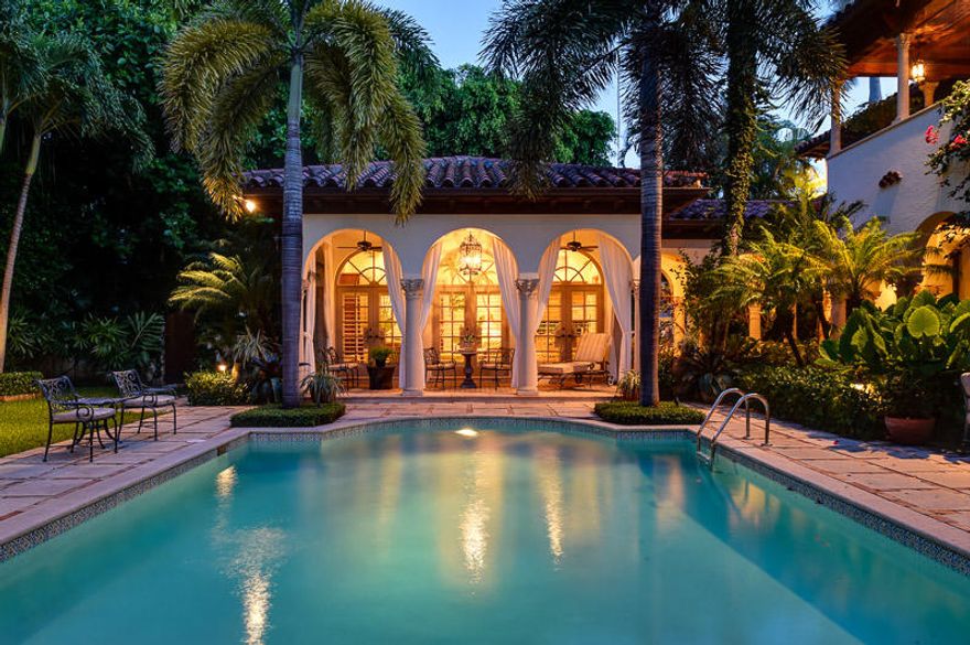 The epitome of Palm Beach's grace and beauty, this Venetian-Inspired villa is situated on Prestigious El Vedado Road, one of the three streets of the Estate Section called the Elegant Els sought after for their historic character, seclusion, and prime in-town location near world famous Worth Avenue. Designed around a magnificent courtyard the well-proportioned floor plan of 12,600+/- sq ft provide eight bedrooms and eight and a half-baths which include the staff quarters and a separate guest house/cabana. French doors across both sides of the L-shaped layout open up the interiors to loggias that surround the courtyard, making outdoor entertaining a way of life in this idyllic oasis of tranquility. Other features, include an elevator and three-bay garage.