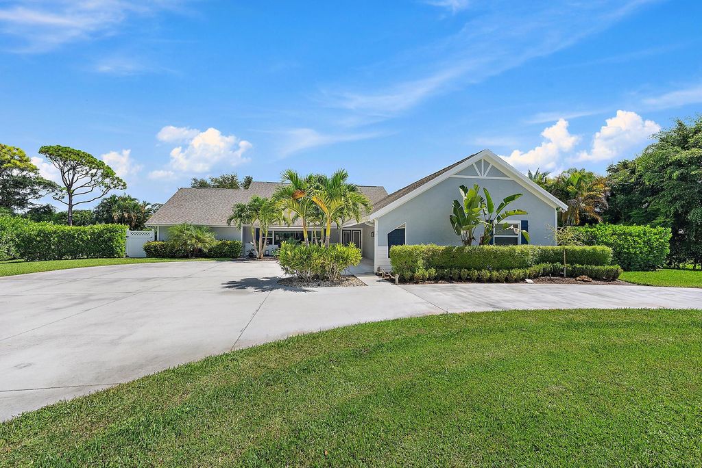 Photo of 11 Loggerhead Lane, Tequesta, FL 33469 (MLS # R11121096)