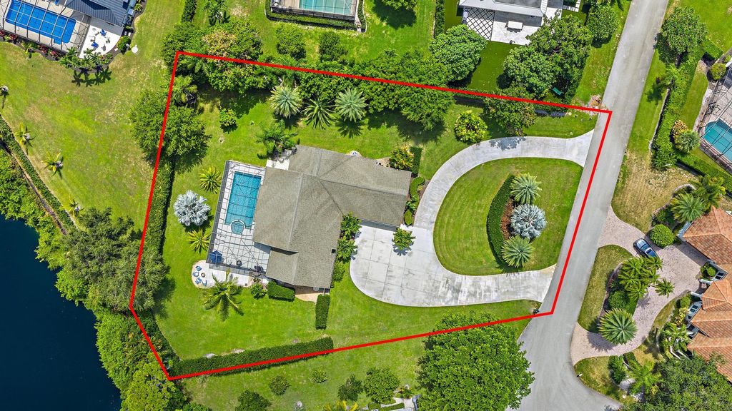 Photo of 11 Loggerhead Lane, Tequesta, FL 33469 (MLS # R11121096)