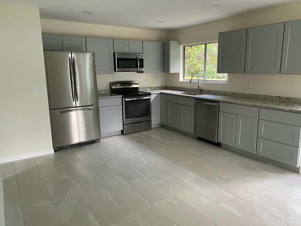 Photo of 255 SW Bridgeport Drive, Port Saint Lucie, FL 34953 (MLS # R11134229)