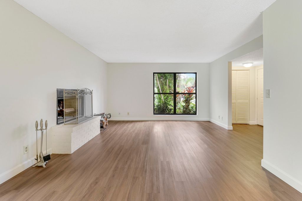 Photo of 313 Sandtree Drive, Palm Beach Gardens, FL 33403 (MLS # R11018793)