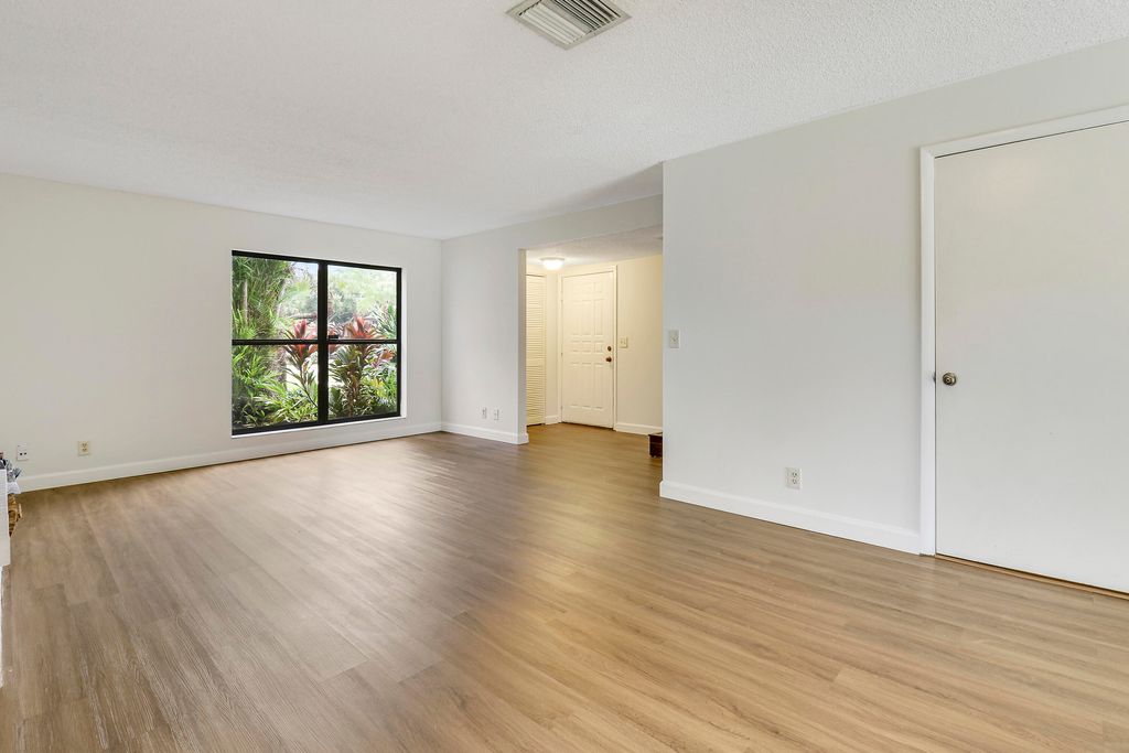 Photo of 313 Sandtree Drive, Palm Beach Gardens, FL 33403 (MLS # R11018793)