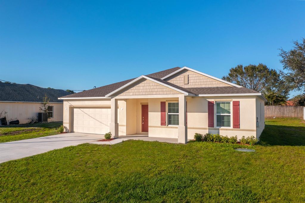 Photo of 5927 NW Brenda Circle, Port Saint Lucie, FL 34986 (MLS # R11046716)